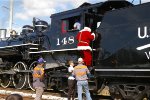 SCFE 148 SANTA CLIMBING DOWN FROM CAB